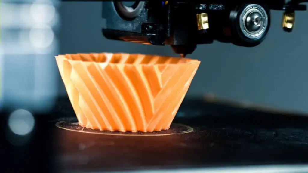 3D Printer printing a vase
