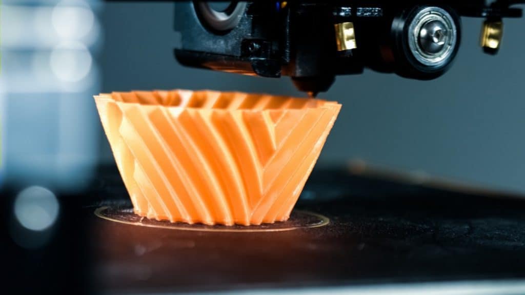 3D Printer printing a vase